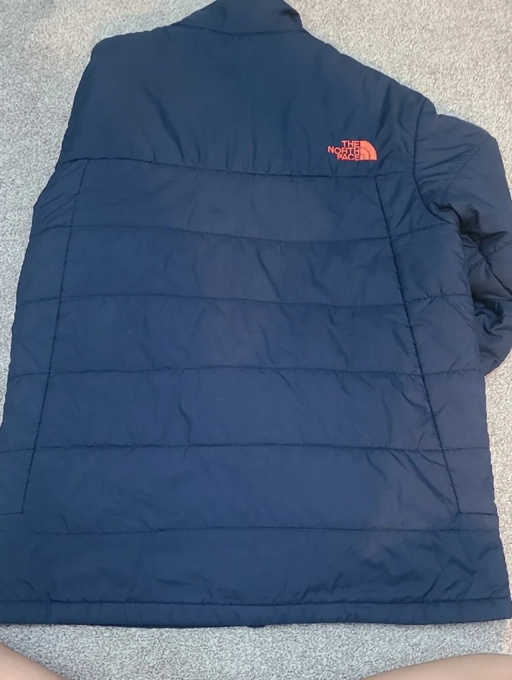 The North Face Navy Blue Jacket with Orange Trim